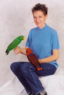 owner with eclectus parrots